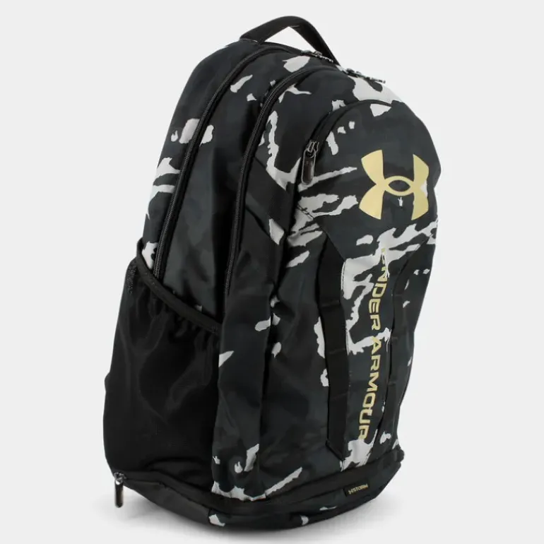 UA HUSTLE 5.0- ZAINI BLACK CAMO GOLD 1361176