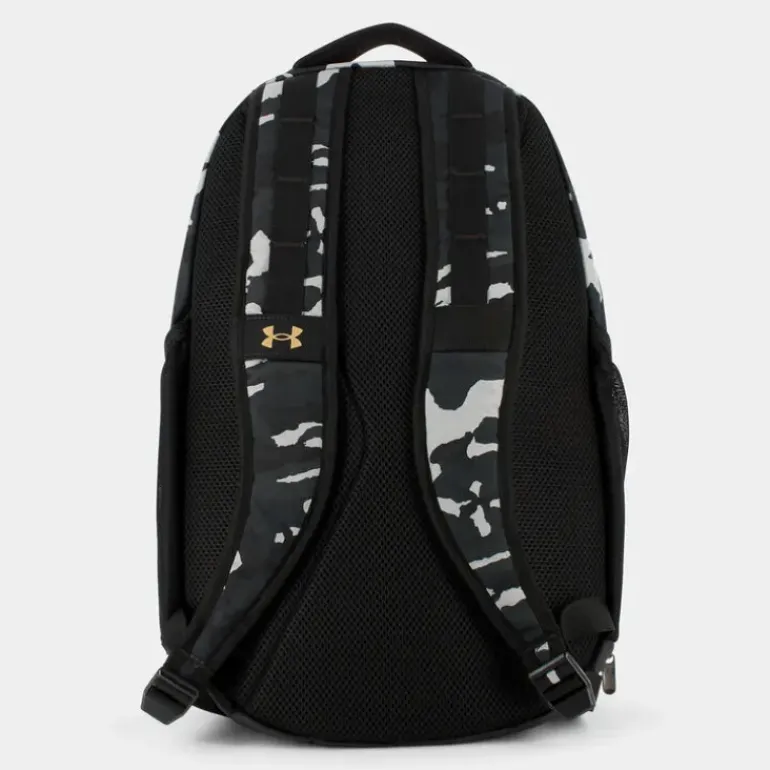 UA HUSTLE 5.0- ZAINI BLACK CAMO GOLD 1361176