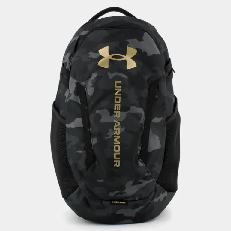UA HUSTLE 6.0- ZAINI BLACK/METALLIC GOLD 1384672